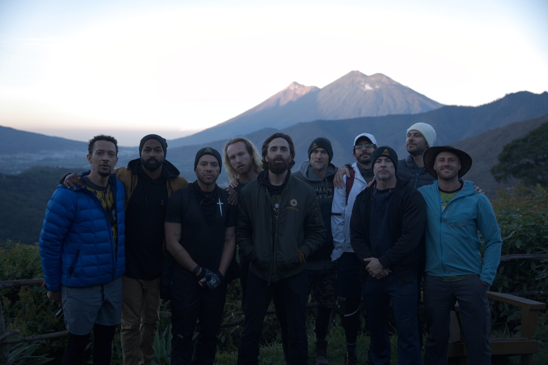 Brotherhood of men gathered at dusk in the Guatemalan highlands